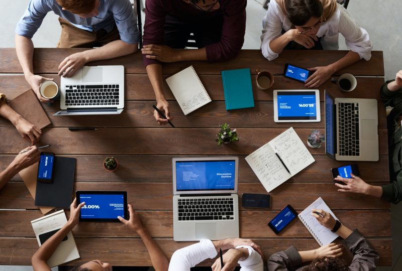 Claim Negotiation Group Sitting Around Table